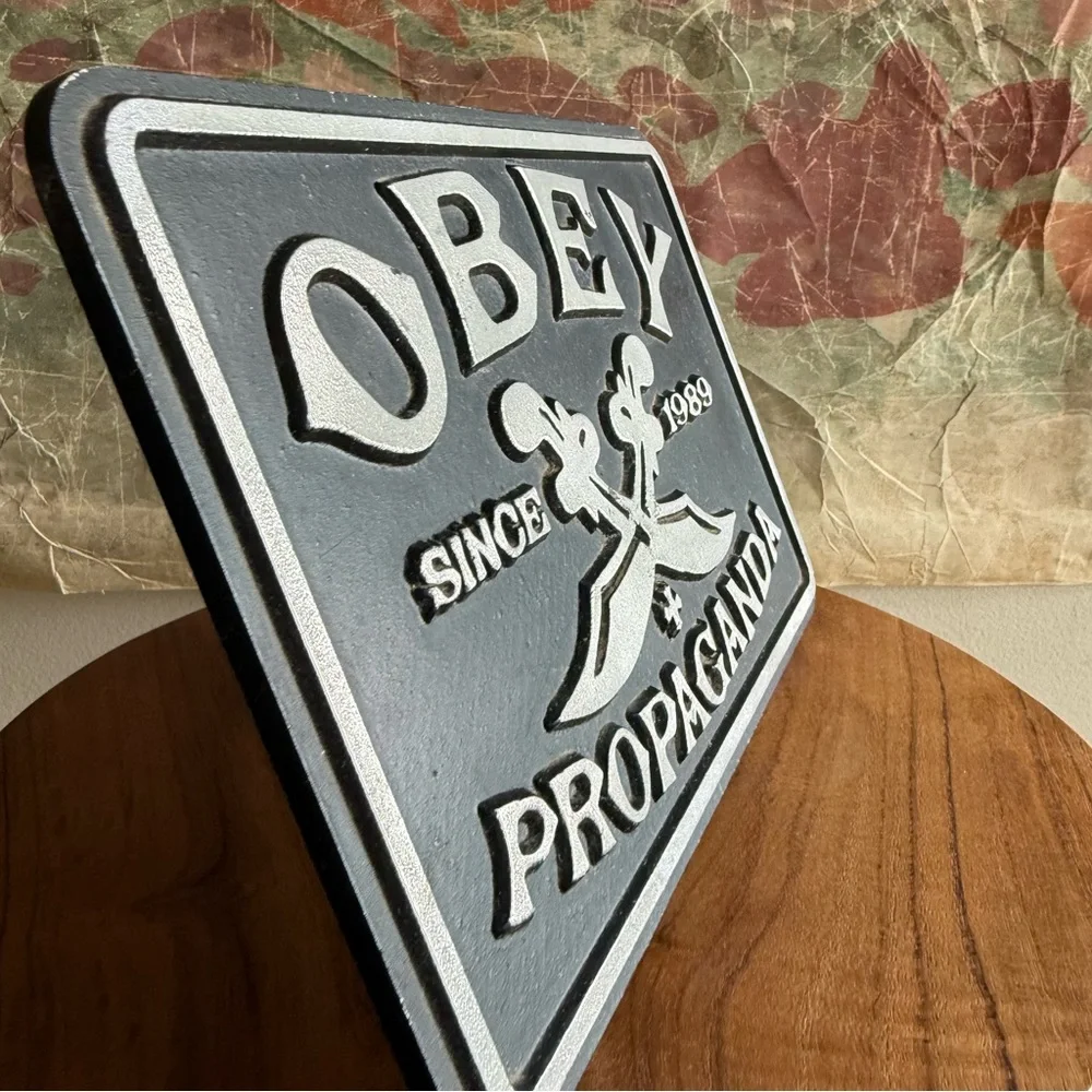 Obey Swords 2009 Shepard Fairey Die Cast Metal Sign Propaganda Plaque